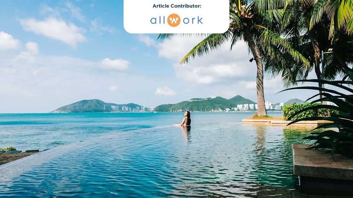 Woman on vacation used arrivia's employer sponsored travel benefits and is enjoying the view from her private pool in Thailand