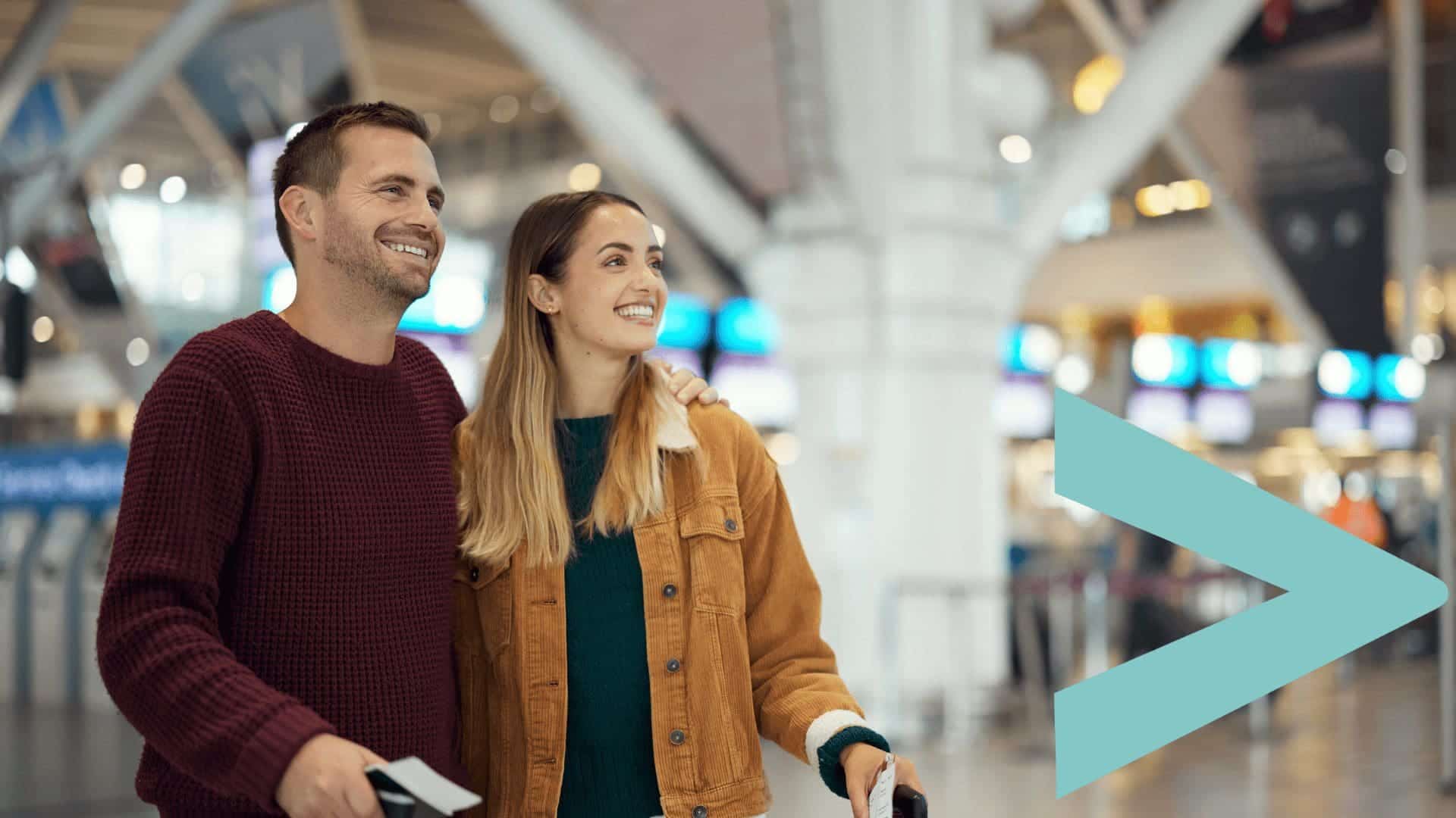 Happy couple waiting to travel