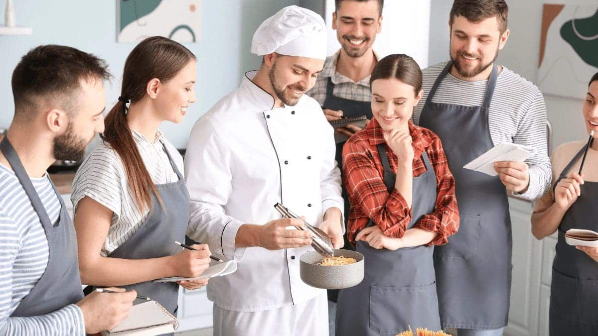 people getting a cooking lesson