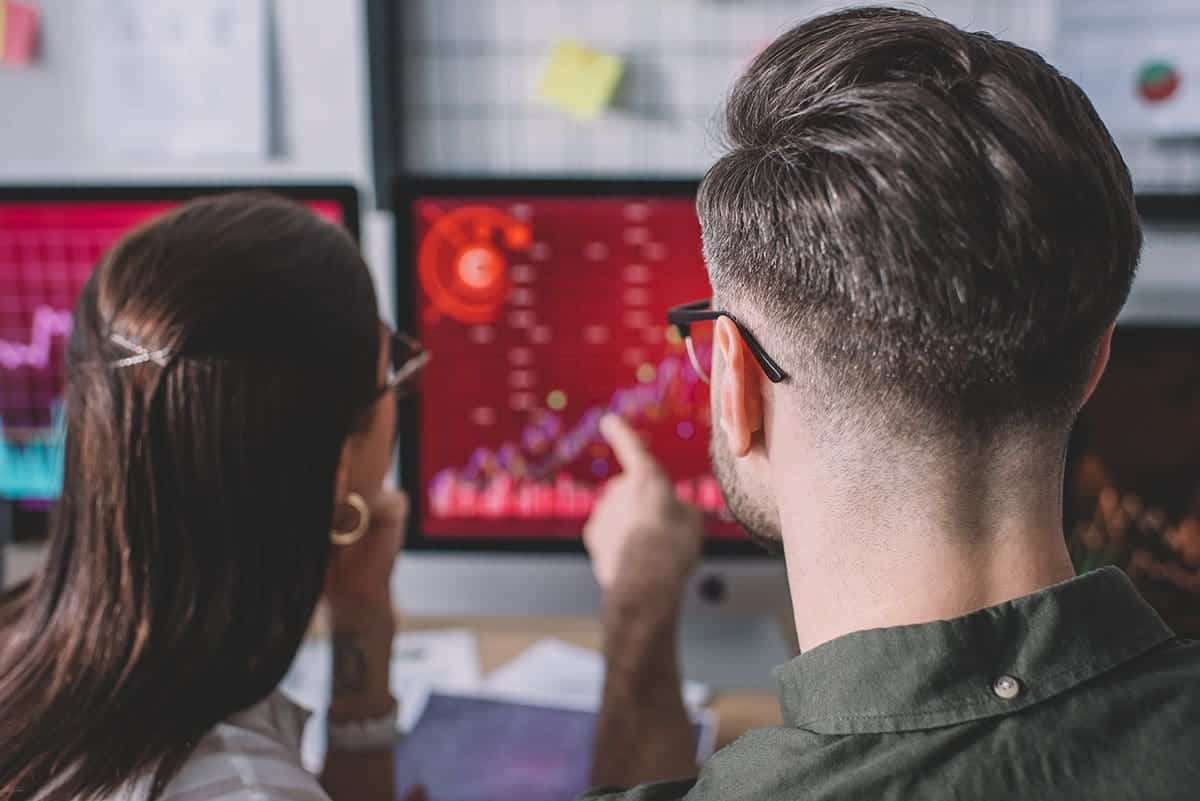 back-view-of-data-analysts-working-on-cyber-protection