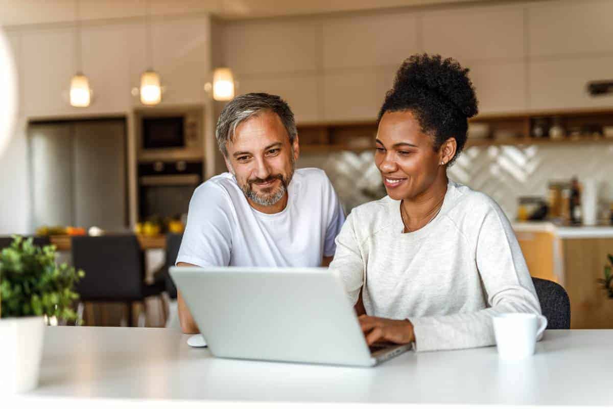 A couple reviews the rewards offered by their loyalty program