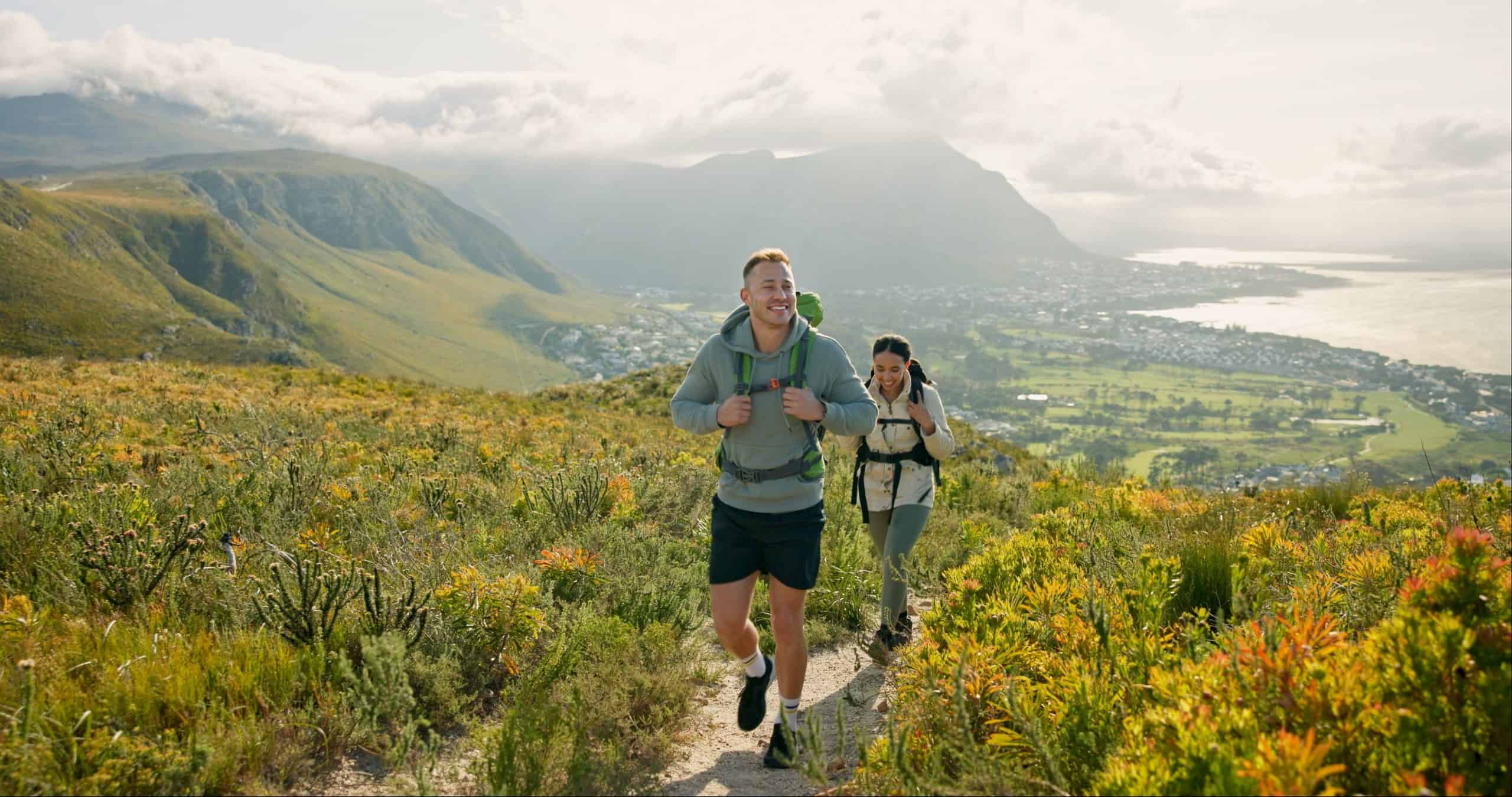 Couple using travel perks to go on hiking trip