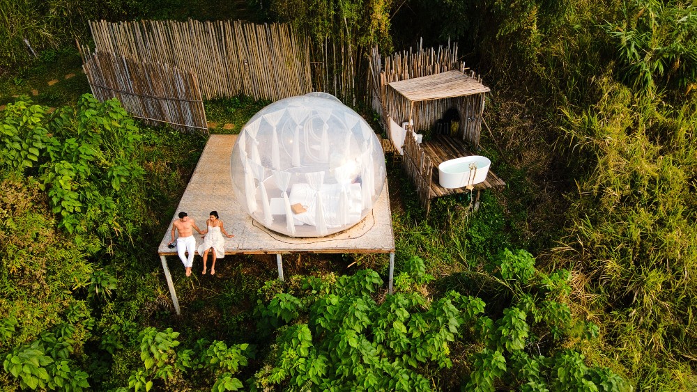 Travelers enjoying an experience provided by travel rewards.